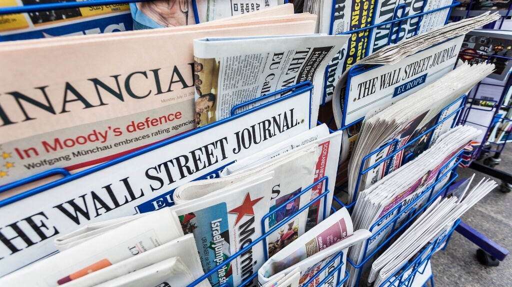 Economy Newspapers on a Newsstand