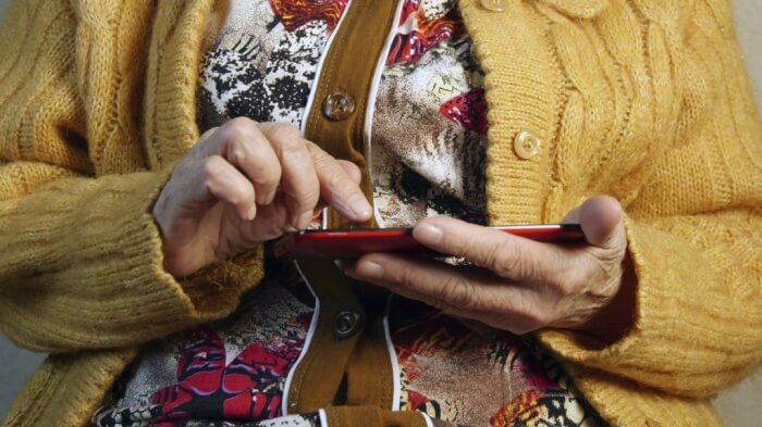 old woman with smartphone