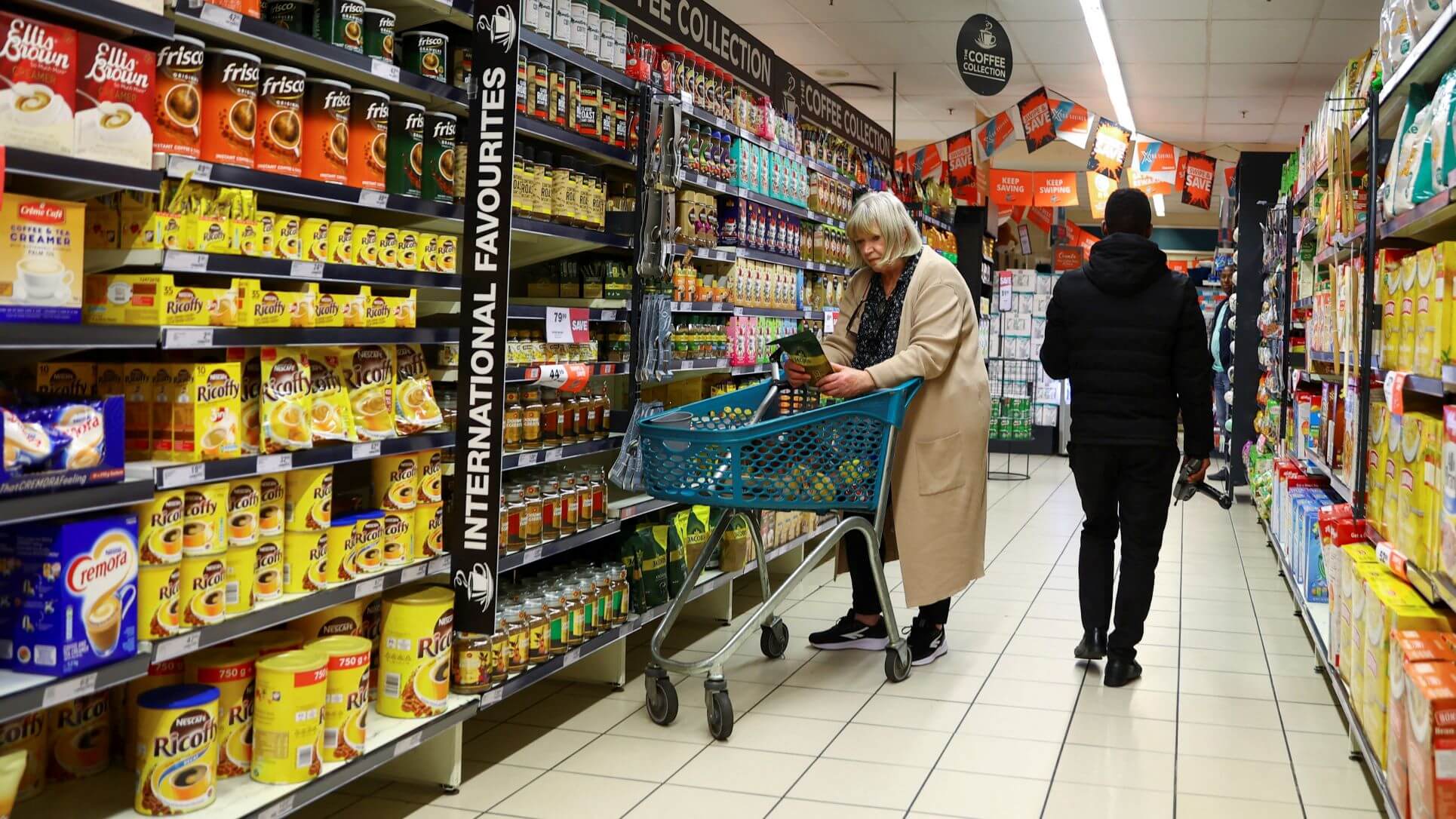 UK Shoppers, Feeling The Inflation Hit, Cut Back On Non-Essentials